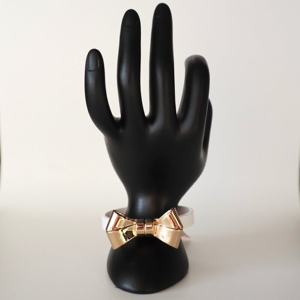 Ted Baker Gold Bow Bracelet With White Band - Elegant & Minimalistic Design